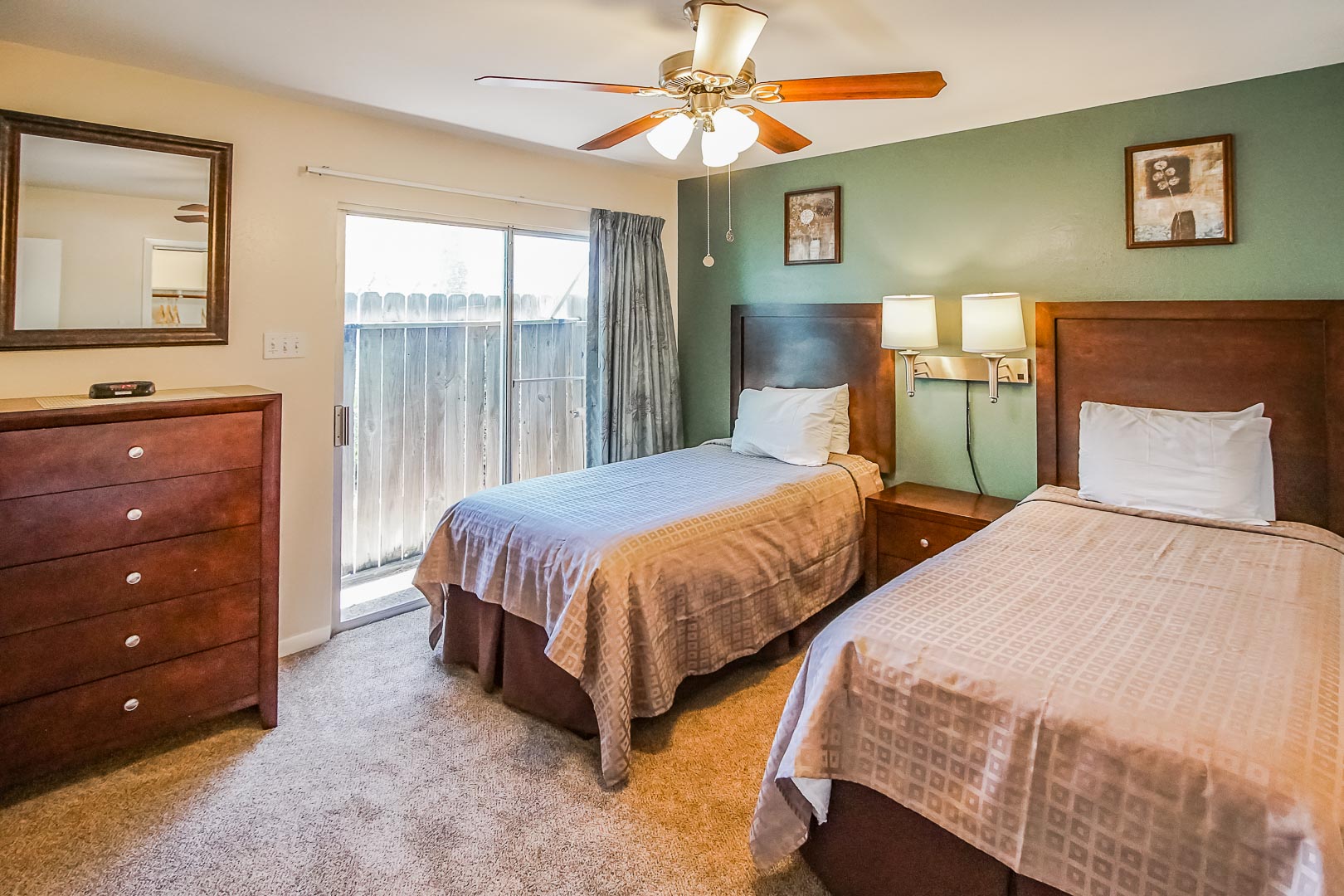 A two bedroom with double beds at VRI's Puente Vista in Texas.